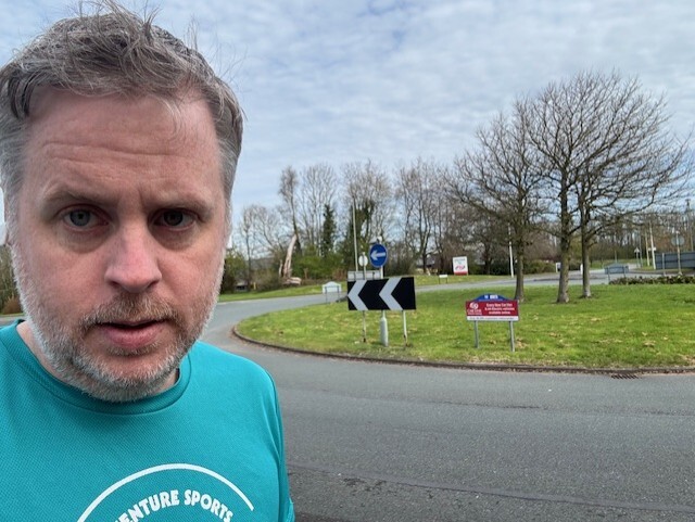 Martin Gate at the first UK Carline sign on the roundabout in Preston