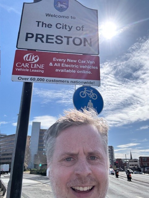 Martin Gate at the UK Carline North Road sign in Preston